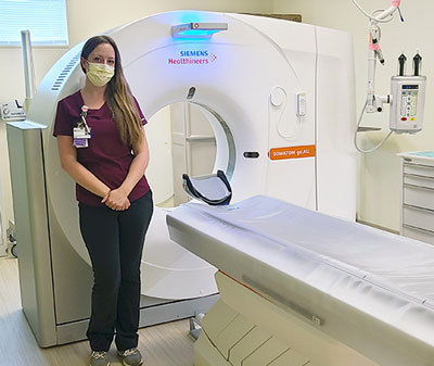 Director of Diagnostic Imaging, Corinna Silvius and CHN's new Siemens 64-slice CT scannernew Siemens 64-slice CT scanner and radiological technician standing nearby
